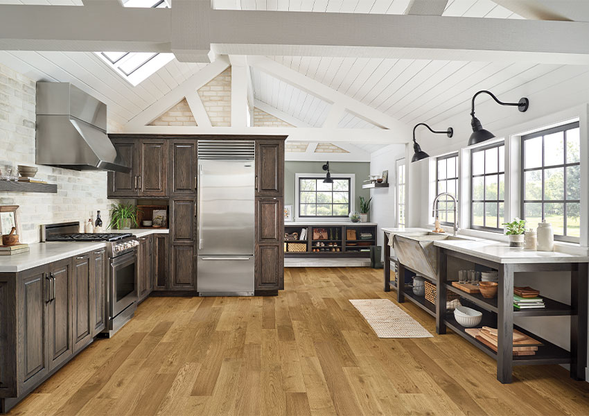 warm toned hardwood flooring in farmhouse kitchen